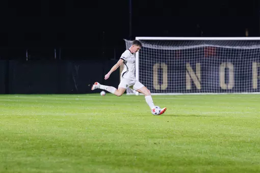 Kelly Cooper kicks ball in Army Soccer Game