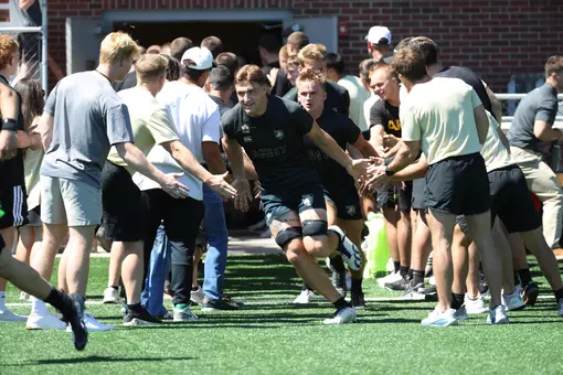 The Army Rugby team takes the field before its season-opening win vs. Queens .