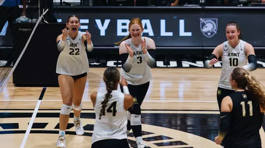 Juliette Myrick, Breelyn Bender and Naomi Chinchar Celebrate a Hannah Hankerson Kill Against UAlbany