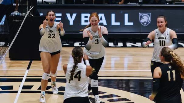 Juliette Myrick, Breelyn Bender and Naomi Chinchar Celebrate a Hannah Hankerson Kill Against UAlbany