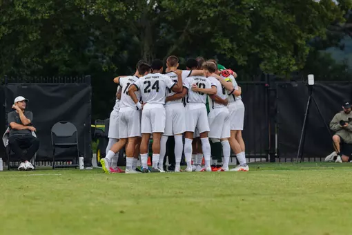 Army Men's Soccer Team Huddles Before a game