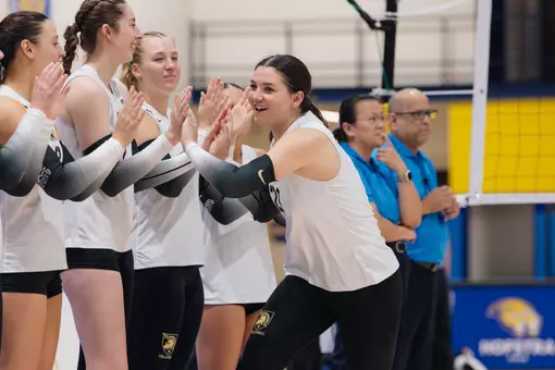 Marlee Lightsey High-Fives Teammates During Starting Lineup Introductions Against Liberty University