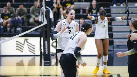 Michelle Parker Cheers with Marlee Lightsey After Kill Against Loyola Maryland