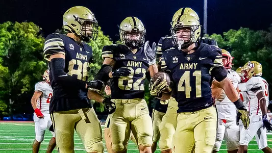 (41) JP Ross celebrated with his teammates after scoring a touchdown in Army' 41-10 victory over Caldwell on Sept. 18, 2026