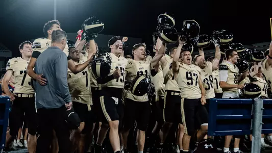 Sprint Football players celebrate after Singing Second after defeating Navy 21-12 in Annapolis, Md. at Navy-Marine Corps Stadium on Sept. 25, 2026
