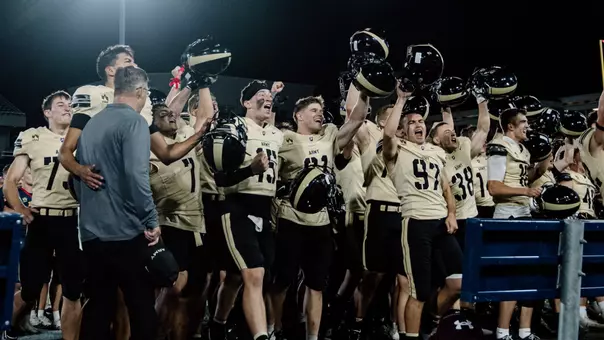 Sprint Football players celebrate after Singing Second after defeating Navy 21-12 in Annapolis, Md. at Navy-Marine Corps Stadium on Sept. 25, 2026