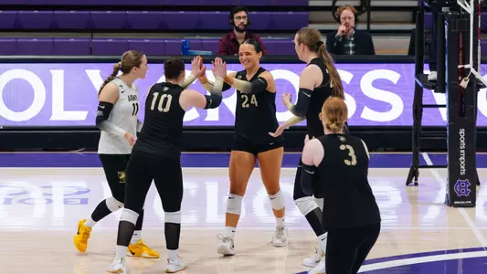 Janie Deapen High-Fives Teammates After Big Kill at Holy Cross