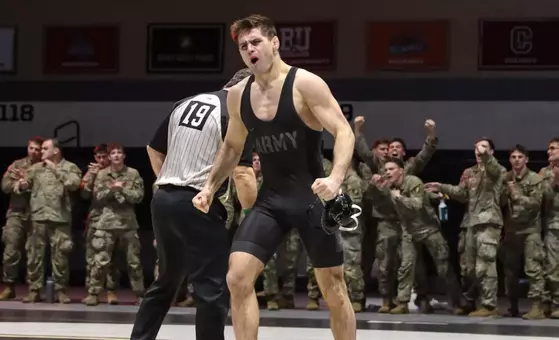 Gunner Filipowicz celebrates a pin in a 2025-26 match vs. Bucknell.