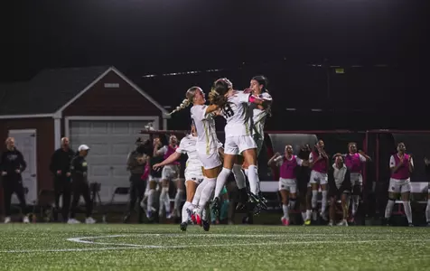 Women's Soccer celebrates Bella Conti's goal at Boston University