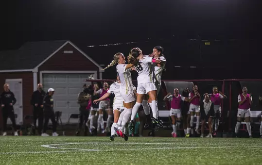 Women's Soccer celebrates Bella Conti's goal at Boston University