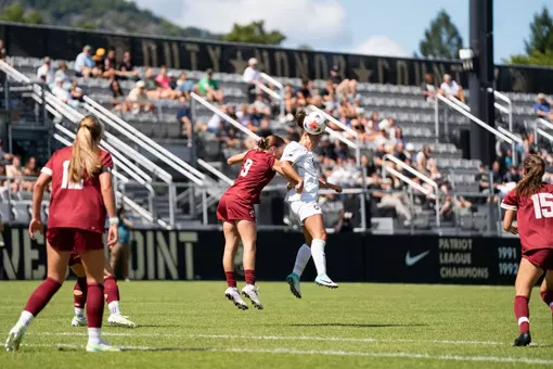 Women's soccer's Leila Castell goes up for a header against Boston College
