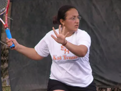 Tennis splits on trip to southern Louisiana