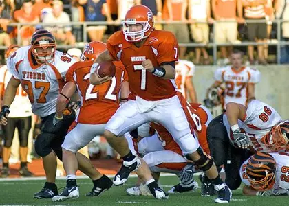 Kats win football opener 58-14