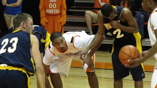 Men's basketball wins opener