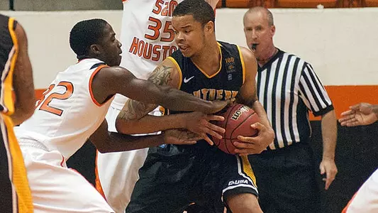 Men's basketball wins in overtime