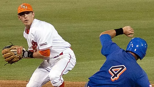 Kats split first two games with UTA