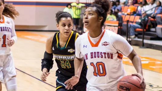 Kats crack win column, down Lions, 68-61