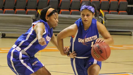 With eye on conditioning, Kats open practice