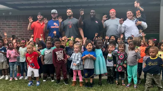 Even during run to playoffs, Kats give back