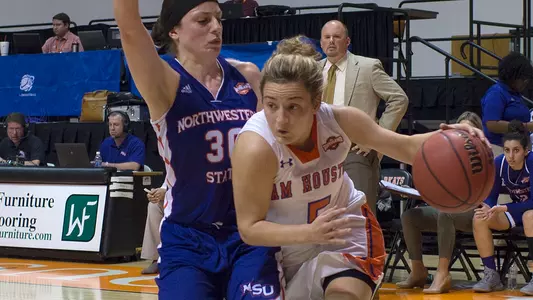 Kats blast Demons, 92-73