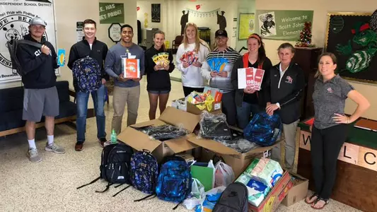 SAAC joins with Academy to give back