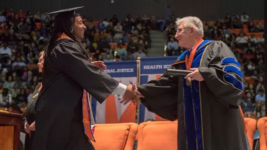 Keith Davis fulfills promise, completes degree