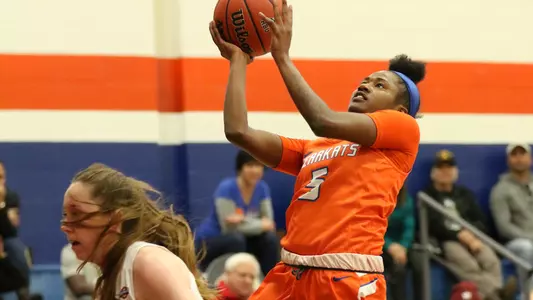 Kats cruise past Huskies