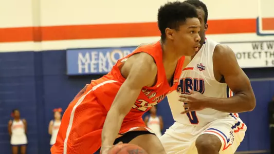 Kats keep hold on first with win at SLU