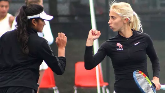 Singles Wins Earn Conference Victory