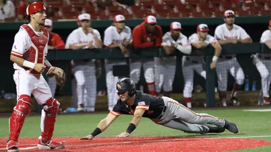 Cougars hold off Kats