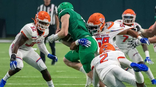 North Dakota holds off Kats