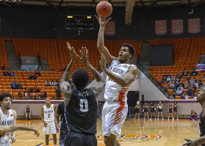 Kai Mitchell shoots a jumper against UCA.