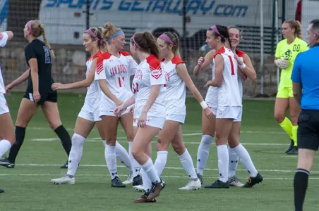 Soccer celebrates goal against ACU