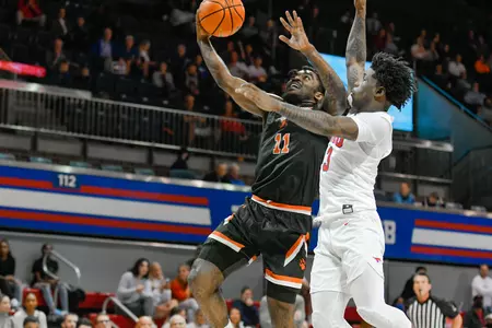 Javion May drives against SMU