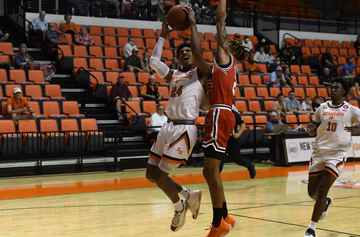 Donte Powers drives against Lamar