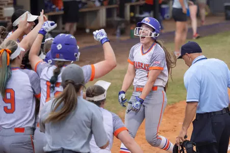 Brooke Malia celebrates home run