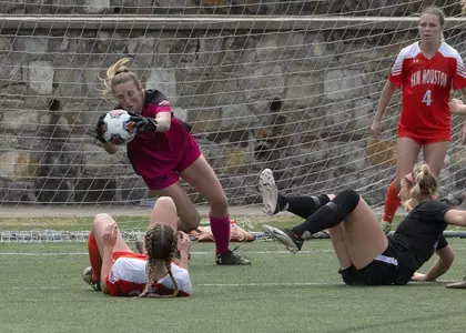Abby DeLozier makes a save against ACU
