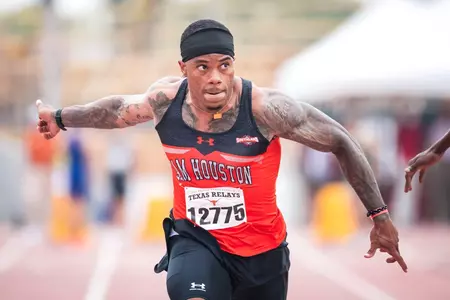 Bryan Henderson runs the 100 at Texas Relays