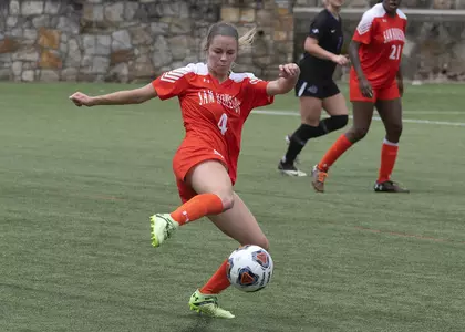 Brooke Jones plays the ball