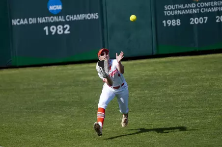 Ellie Grill playing runs down a fly ball vs HBU