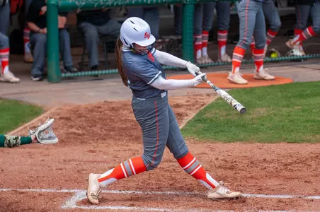 Brooke Malia bats against SLU.