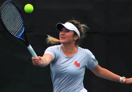 Petra Kaszas returns a shot