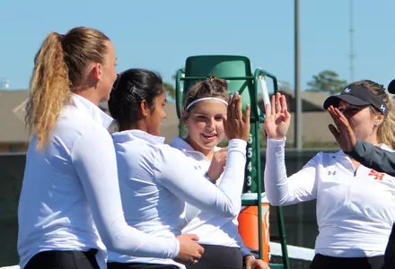 2022 Tennis team celebrating
