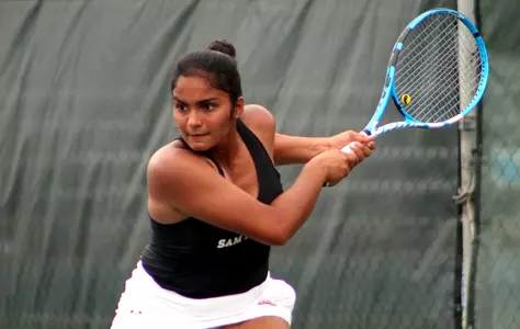 Sahithi Vutukuru gets ready to return a shot against Rice