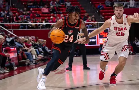 Donte Powers drives against Utah