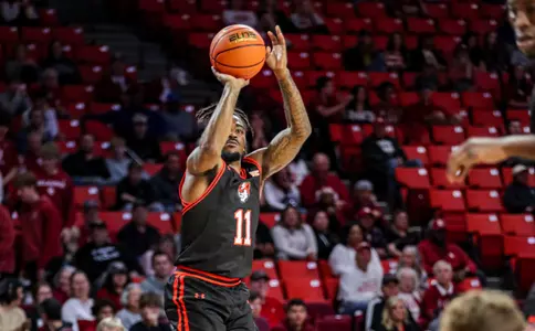 Javion May shoots against Oklahoma
