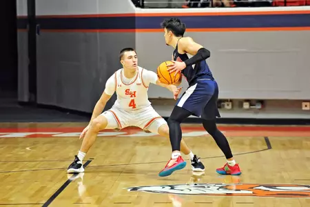 Anthony Wrzeszcz guards an ABU ball handler