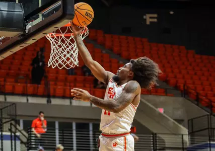 Javion May lays it in against Dallas Christian