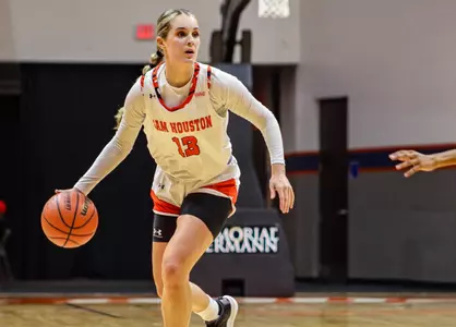 Kaylee Jefferson dribbles against Jarvis Christian