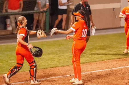 Mika Vento and Hannah Scheaffer celebrate